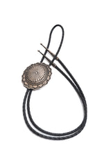 Load image into Gallery viewer, Vintage Navajo Silver Stamped Bolo-Tie with black braided leather cords on a white background

