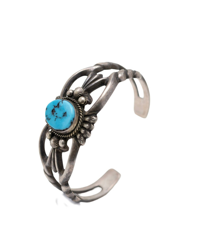 Vintage Cast Silver bracelet with a Sleeping Beauty Turquoise on a white background