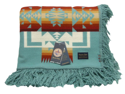 Pendleton Chief Joseph shawl in aqua, featuring a traditional Native American-inspired geometric pattern with arrow motifs, folded neatly to show intricate design and soft wool texture