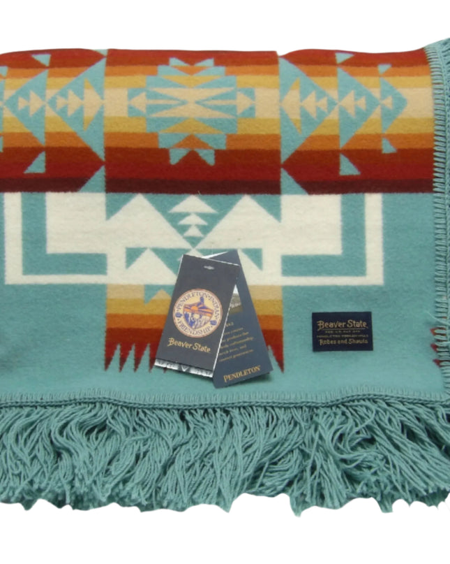 Pendleton Chief Joseph shawl in aqua, featuring a traditional Native American-inspired geometric pattern with arrow motifs, folded neatly to show intricate design and soft wool texture
