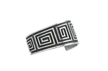 Load image into Gallery viewer, Navajo sterling silver bracelet with black oxidize maze pattern on a light gray background
