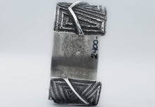 Load image into Gallery viewer, Aaron Anderson Navajo Tufa Cast with a Shiny Silver Zig-zag Overlay
