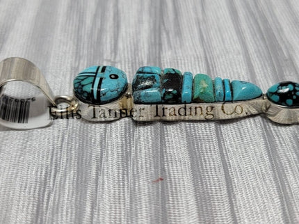 Ervin P. Tsosie Bisbee Yei Inlay Pendant