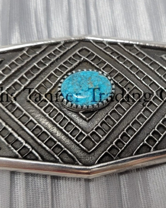 Handmade silver belt buckle with one Kingman Turquoise stone in the center
