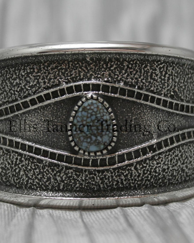 Harrison Jim Silver Bracelet with one Number 8 turquoise stone in center