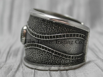 Harrison Jim Silver Bracelet with one Number 8 turquoise stone in center left side view