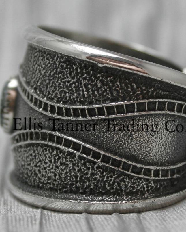 Harrison Jim Silver Bracelet with one Number 8 turquoise stone in center left side view