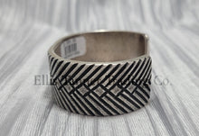 Load image into Gallery viewer, heavy, etched diamond designs front view of bracelet, displayed on top of a silver shiny cloth, side views

