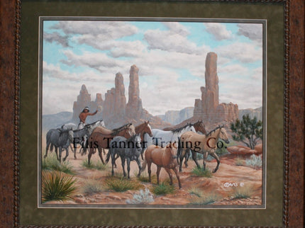 Picture of painting called Spider Rock. Painting shows 11 horses being herded by a Navajo holding a rope in his left hand. He is riding one of the horses and wearing a white headband. Behind the horses are several tall rock structures including the famous Spider Rick from the Navajo Stories.