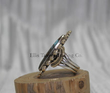 Load image into Gallery viewer, Ring by Tommy Jackson 14k overlay with Bisbee turquoise on wooden display 
