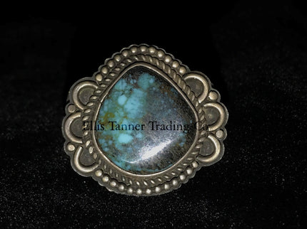 Tommy Jackson Ring with a Silver Twist Bezel, In center a round Bisbee Turquoise, Front View 